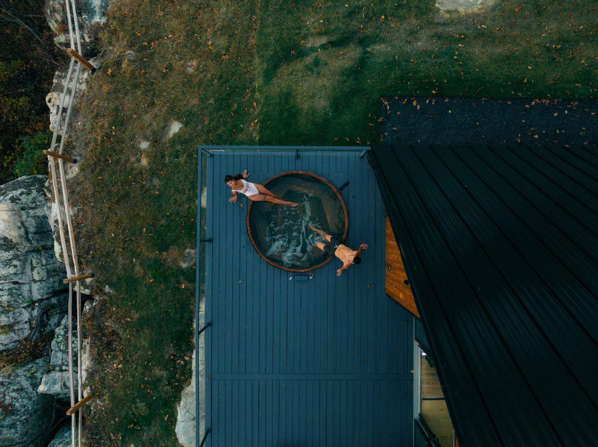 Alaskan cedar hot tub on a private bluffside deck with panoramic Sequatchie Valley views at The A-Frame, Tennessee