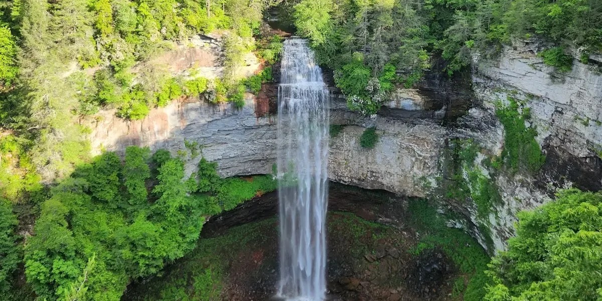 Fall Creek Falls 256-foot waterfall plunging into a gorge pool surrounded by forest on the Cumberland Plateau, Tennessee