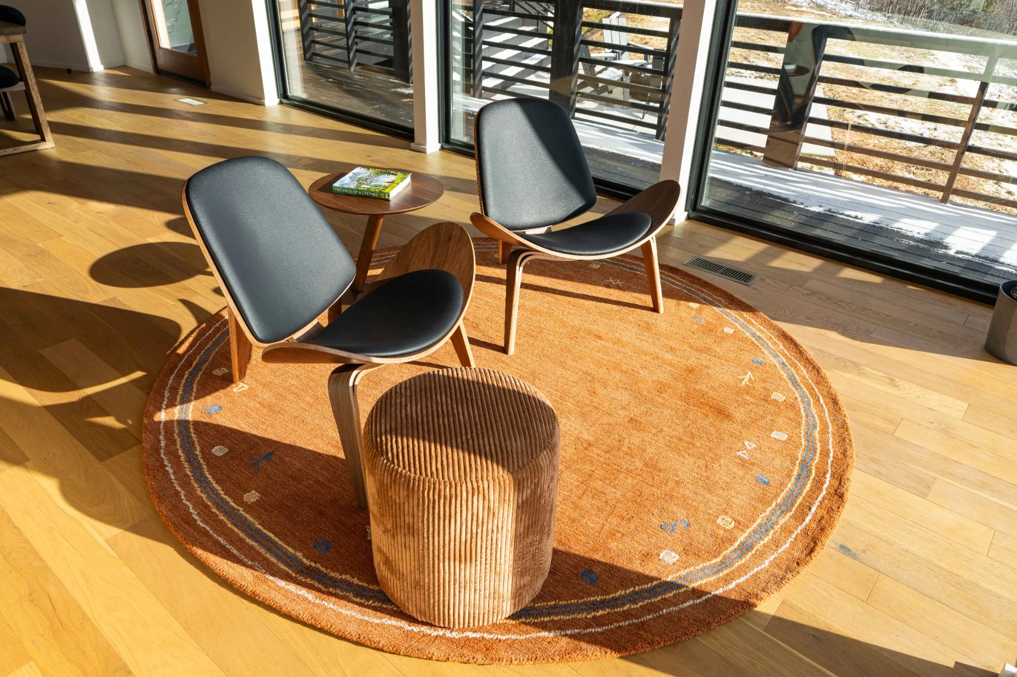 Shell chairs sitting nook with valley view at Jackson Point Sewanee