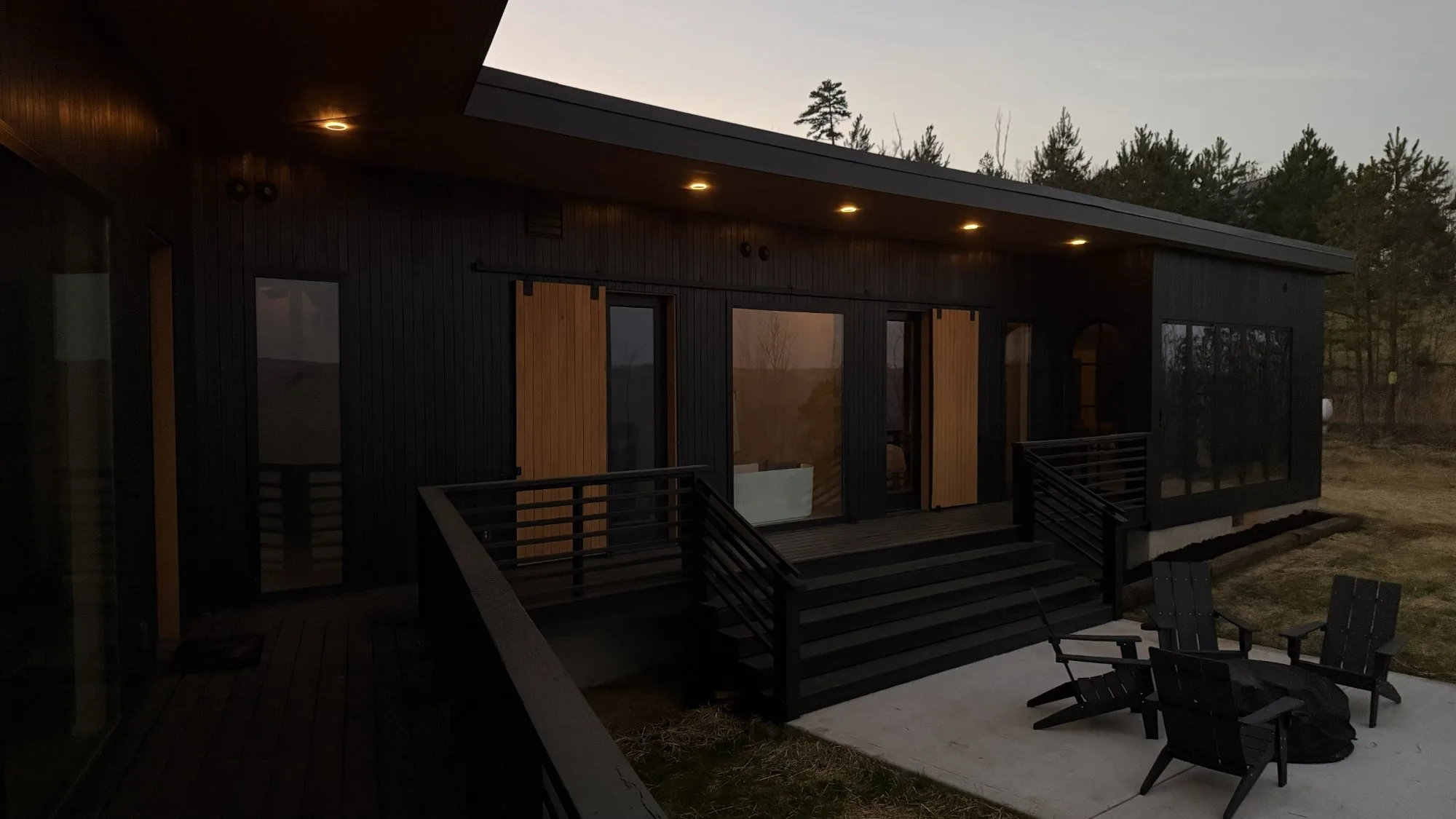 Jackson Point exterior at night with warm interior lights Sewanee Tennessee