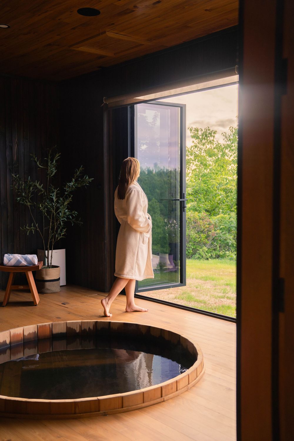 Cedar soaking tub in the Wellness Room at Jackson Point, overlooking the valley